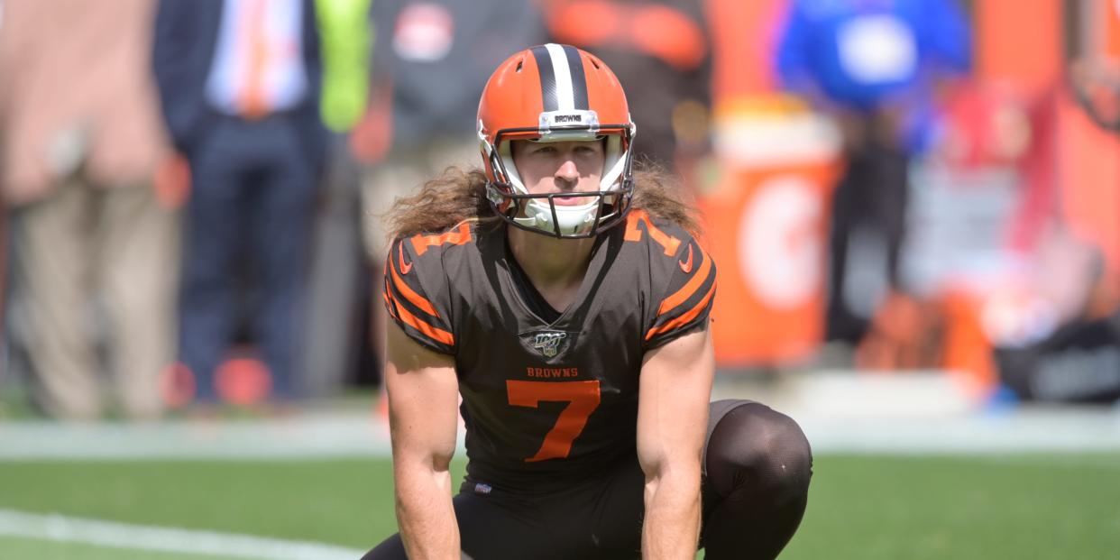 Cleveland Browns punter Jamie Gillan warms up before an NFL football game.