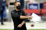 Arizona Cardinals head coach Kliff Kingsbury watches his team prior to an NFL football game against the Detroit Lions, Sunday, Sept. 27, 2020, in Glendale, Ariz. (AP Photo/Ross D. Franklin)