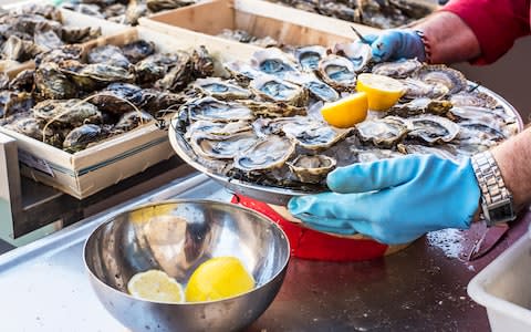 The French pop briny Breton oysters like sweets at Christmas - Credit: PHOTOOIASSON