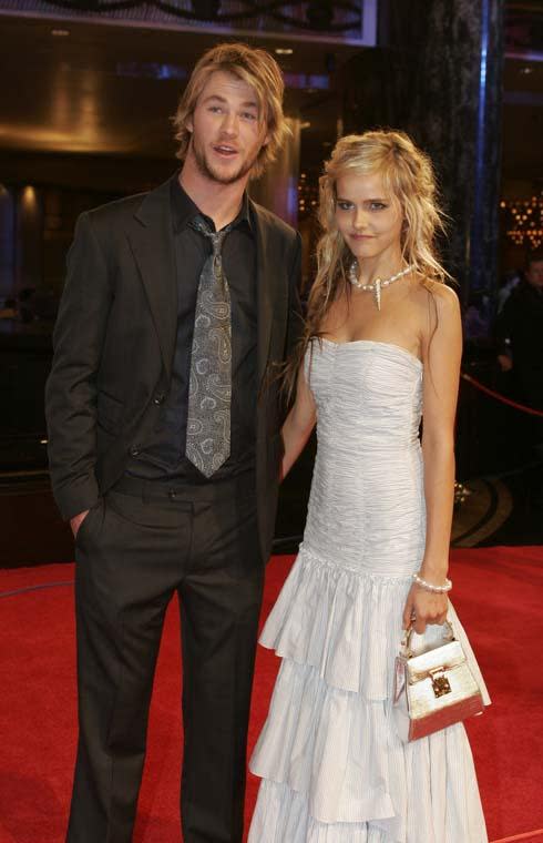 <p>Despite Chris's astonishingly long tie and Isabel's vampire slaying necklace at the 2006 Logies, the pair put on a show for the cameras.</p>