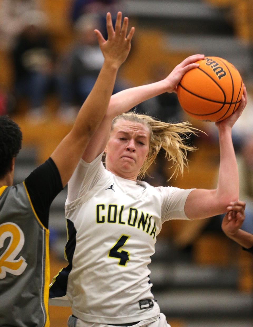 Colonia's Taylor Derkack looks to pass against South Brunswick in the girls basketball game on Jan. 20, 2024