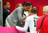 LONDON, ENGLAND - JULY 29: First Lady Michelle Obama talks with Kobe Bryant #10 after their Men's Basketball Game between the United States and France on Day 2 of the London 2012 Olympic Games at the Basketball Arena on July 29, 2012 in London, England. (Photo by Jamie Squire/Getty Images)