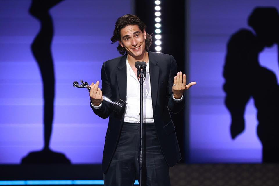 Enzo Vogrincic accepts the Best Male Actor Performance award for La sociedad de la nieve during the 11th edition of Premios Platino at Xcaret on April 20, 2024 in Riviera Maya, Mexico.