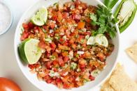 <p>Unlike salsa, where all the ingredients are blended, <a href="https://www.delish.com/cooking/recipe-ideas/a32675299/classic-pico-de-gallo-recipe/" rel="nofollow noopener" target="_blank" data-ylk="slk:pico de gallo;elm:context_link;itc:0;sec:content-canvas" class="link ">pico de gallo</a> is a mixture, so it'll add a nice chunky texture to any taco. It's also excellent for scooping with tortilla chips.</p>