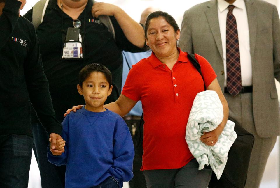 Darwin Micheal Mejia and his mother Beata Mariana de Jesus Mejia-Mejia are reunited on June 22, 2018 in Linthicum, Md., after they were separated at the border and she sued the U.S. government.