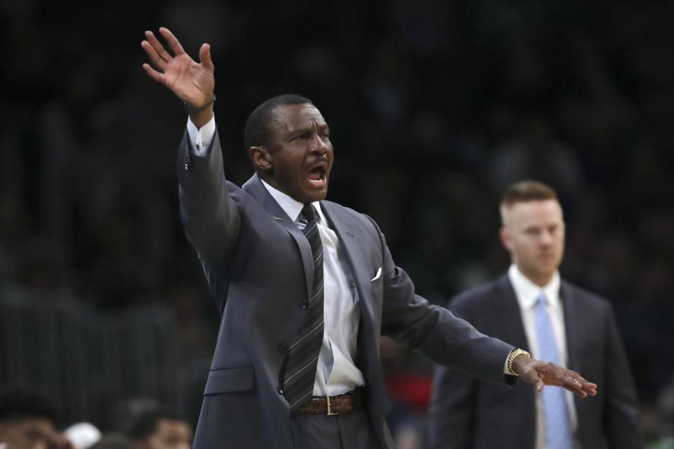 Detroit Pistons head coach Dwane Casey calls to his players during the first half of an NBA basketball game against the Boston Celtics in Boston, Wednesday, Jan. 15, 2020. (AP Photo/Charles Krupa)