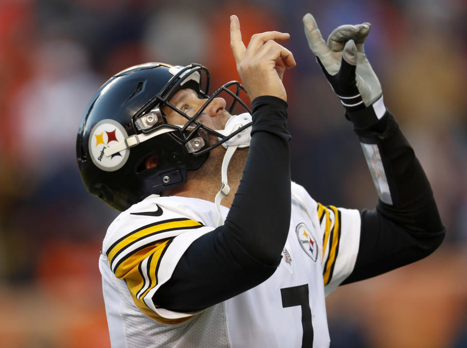 Pittsburgh Steelers quarterback Ben Roethlisberger (7) celebrates his touchdown throw to wide receiver JuJu Smith-Schuster (19) during the first half of an NFL football game against the Denver Broncos, Sunday, Nov. 25, 2018, in Denver. (AP Photo/David Zalubowski)