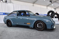 <p>JH Restorations in Windsor, Canada, conceived this modified Merkur as a modern upgrade to the Sierra RS500 Cosworth. It has a custom bodykit, Ford Area 51 blue paint, a 2.3-litre turbo engine and a Bowler-prepped Tremec TKX 5-speed transmission. There are elements of Mustang and C6 Corvette in the drivetrain and suspension, too.</p>