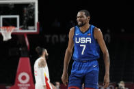 United States' Kevin Durant (7) reacts during men's basketball quarterfinal game against Spain at the 2020 Summer Olympics, Tuesday, Aug. 3, 2021, in Saitama, Japan. (AP Photo/Eric Gay)