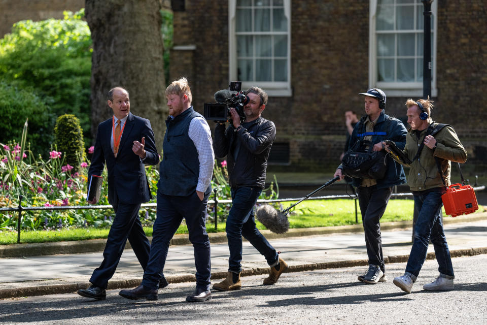 Kaleb Cooper and Charlie Ireland being filmed for Clarkson's Farm at Downing Street