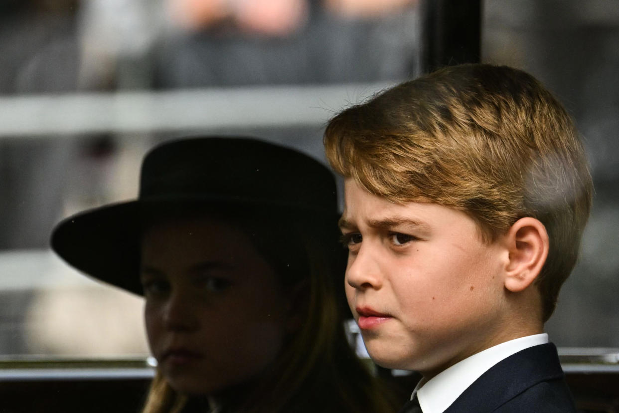 Princess Charlotte of Wales and Prince George of Wales travel by car from Westminster Abbey to Wellington Arch after the State Funeral of Queen Elizabeth II (Photo by Sebastien Bozon - WPA Pool/Getty Images)