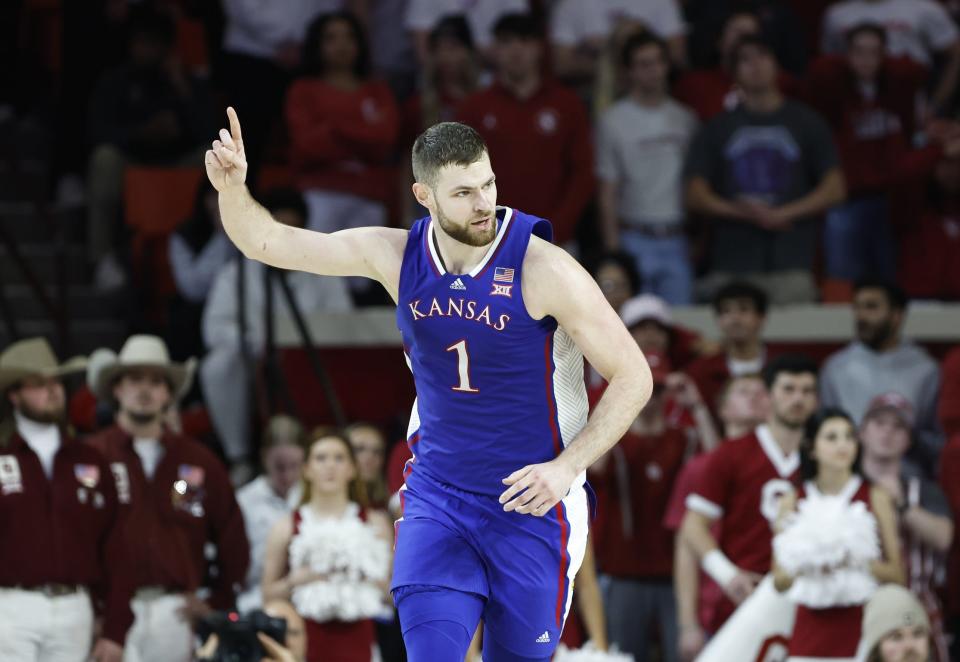 Feb 17, 2024; Norman, Oklahoma, USA; Kansas Jayhawks center Hunter Dickinson (1) gestures after scoring a basket against the Oklahoma Sooners during the second half at Lloyd Noble Center. Mandatory Credit: Alonzo Adams-USA TODAY Sports