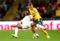 Football - England v Lithuania - UEFA Euro 2016 Qualifying Group E - Wembley Stadium, London, England - 27/3/15 England's Raheem Sterling in action with Lithuania's Vaidas Slavickas Reuters / Dylan Martinez Livepic