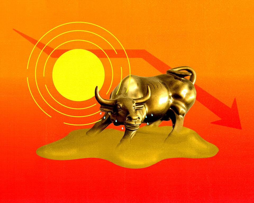 A photo illustration of the Wall Street bull under a sun. The bull has beads of sweat coming off of it.