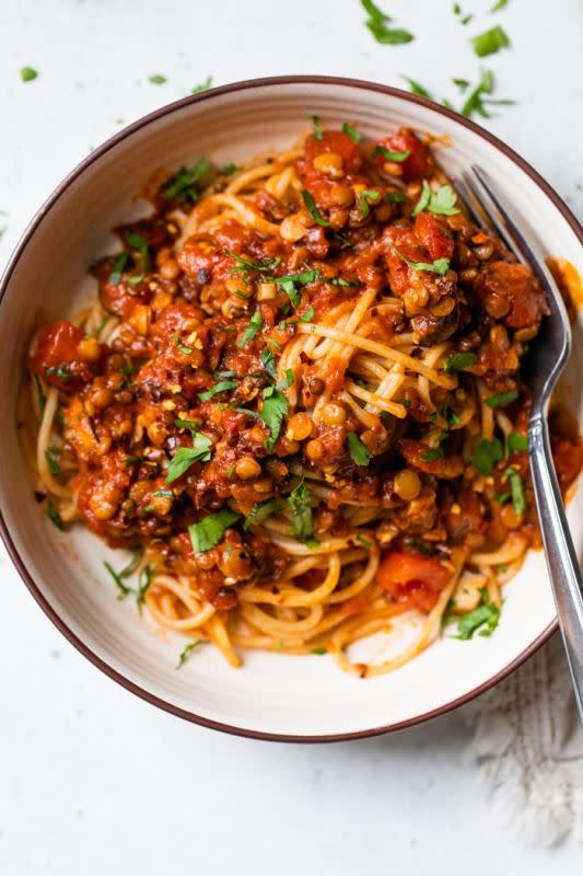 <p>The Almond Eater</p><p>This easy bolognese recipe is a quick weeknight meal that just so happens to be vegan and gluten-free. It’s filled with flavor and a great way to switch up pasta—plus, it comes together in under 30 minutes!</p><p><strong>Get the recipe: <a href="https://thealmondeater.com/lentil-bolognese-recipe-vegan-gluten-free/" rel="nofollow noopener" target="_blank" data-ylk="slk:Lentil Bolognese;elm:context_link;itc:0;sec:content-canvas" class="link ">Lentil Bolognese</a></strong></p>