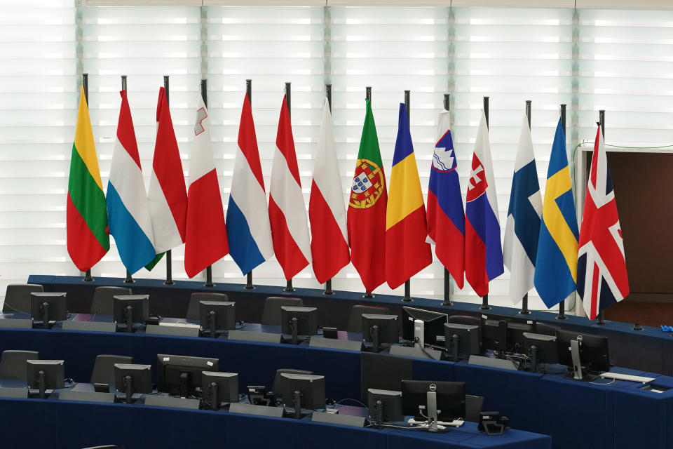 STRASBOURG, FRANCE - JANUARY 27: The British Union Jack flag (R) is displayed amongst European Union member countries' national flags inside of the European Parliament on January 27, 2020 in Strasbourg, France. The United Kingdom is set to depart the European Union on January 31, entering a transition period in which it will negotiate a new trade agreement with the bloc. (Photo by Thomas Niedermueller/Getty Images)