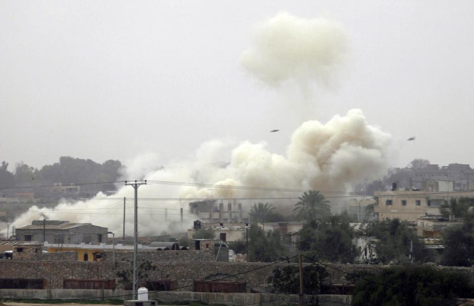 Smoke rises after an explosion during a military operation by Egyptian security forces in the Egyptian city of Rafah, near the border with Gaza