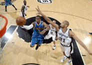 <p>2009: Chris Paul #3 of the New Orleans Hornets drives to the basket for a layup against Tony Parker #9 and Tim Duncan #21 of the San Antonio Spurs during the game at AT&T Center on April 15, 2009 in San Antonio, Texas. </p>