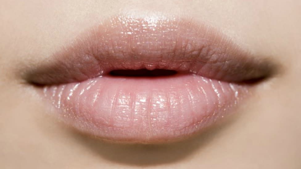 Women are gluing their top lips in a bid to achieve a plumper pout Photo: Getty