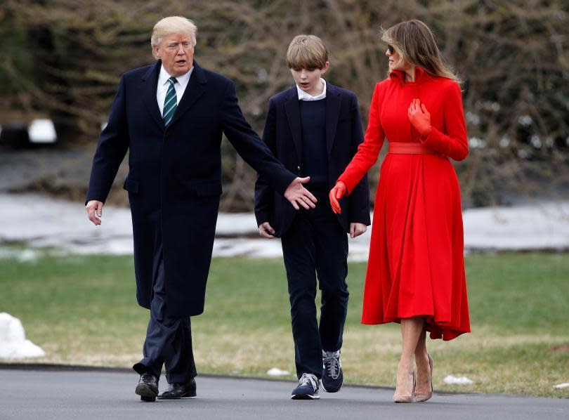 Barron Trump with parents