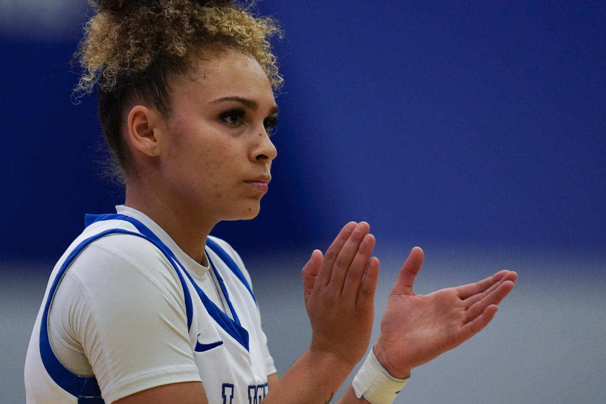 La Jolla Country Day high school point guard Jada Williams looks on during a basketball game Friday, Nov. 18, 2022, in Chatsworth, Calif. If there's a face of the bold new frontier of name, image and likeness (NIL) at the high school level, it might as well be the 17-year-old Williams, who is a senior point guard at San Diego's La Jolla Country Day. (AP Photo/Gregory Bull)