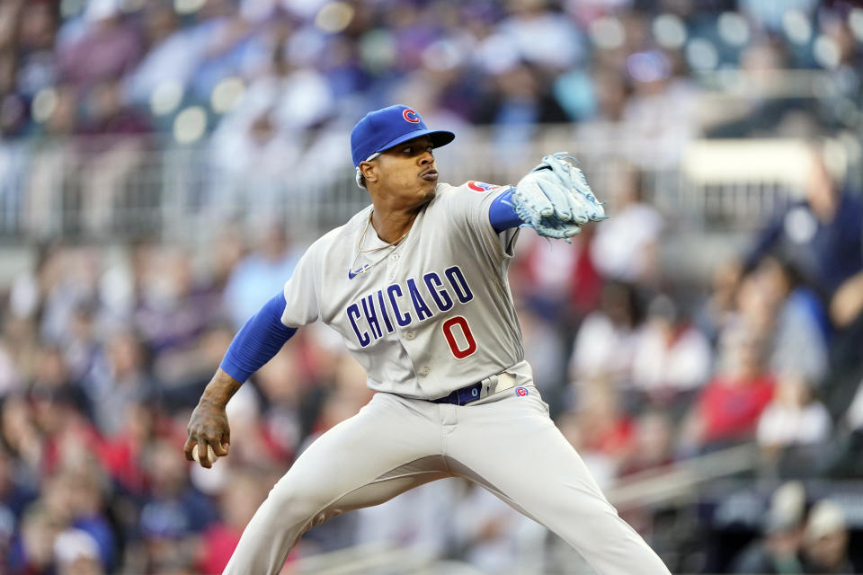 Chicago Cubs starting pitcher Marcus Stroman (0) delivers in the first inning of a baseball game against the Atlanta Braves, Tuesday, April 26, 2022, in Atlanta. (AP Photo/Brynn Anderson)