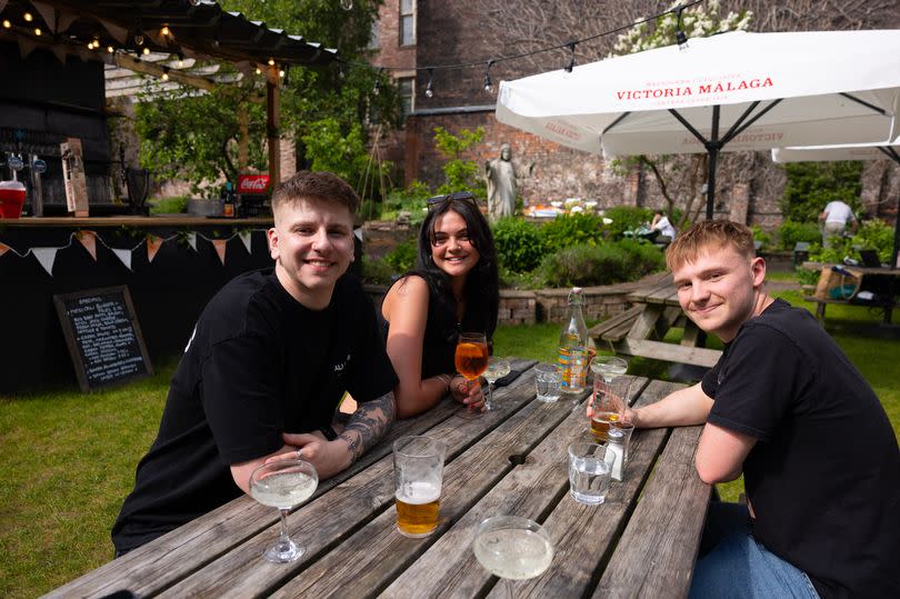 Customers enjoying Free State Kitchen's beer garden on Maryland Street