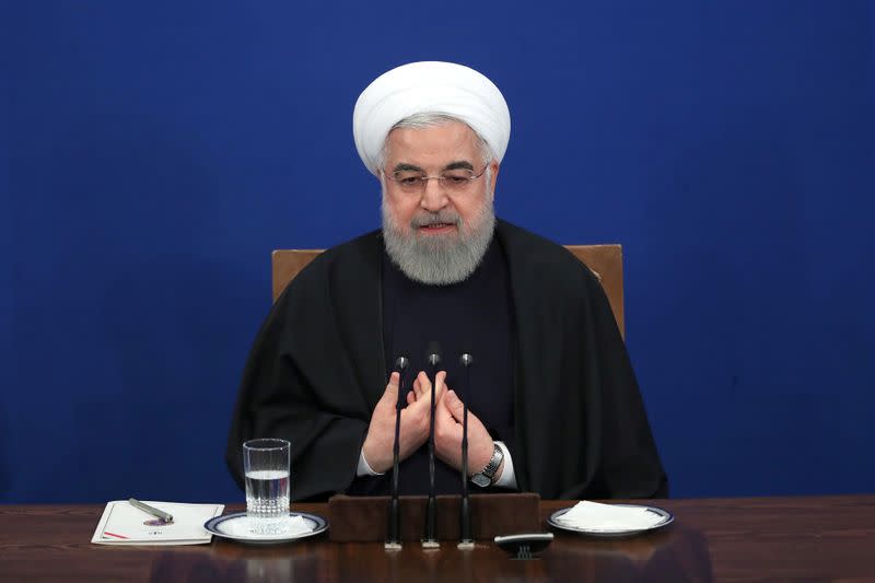 Iranian President Hassan Rouhani speaks during a news conference in Tehran