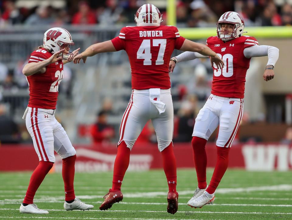 Oct 14, 2023; Madison, Wisconsin, USA; Wisconsin Badgers punter Gavin Meyers (28), long snapper Peter Bowden (47) and place kicker Nathanial Vakos (90) celebrate after a field goal by Vakos against the Iowa Hawkeyes at Camp Randall Stadium. Mandatory Credit: Tork Mason-USA TODAY Sports