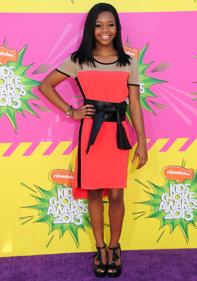 Celebrities in neon fashion: Gabby Douglas looked pretty in a neon dress.<br><br>[Rex]