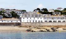 <p>There's fun for everyone at <a href="https://www.booking.com/hotel/gb/the-idle-rocks-hotel.en-gb.htm?aid=2070936&label=family-holidays-cornwall" rel="nofollow noopener" target="_blank" data-ylk="slk:The Idle Rocks;elm:context_link;itc:0;sec:content-canvas" class="link ">The Idle Rocks</a> - a cool hotel oozing laidback beach vibes. Sitting on the quayside in the charming traditional fishing village of St Mawes on the Roseland Peninsula, it's surrounded by secluded coves, delightful creeks, lush countryside, tranquil beaches and scenic cliffs to go exploring and walking.</p><p>At the hotel, there's a lovely kids' playroom, family rooms and children's menus. But, let's face it, this is all about the outdoor playground available right on the doorstep. You can go kayaking or paddleboarding, hire a sailing dinghy, or take the whole family on an exhilarating RIB ride.</p><p><a class="link " href="https://www.booking.com/hotel/gb/the-idle-rocks-hotel.en-gb.htm?aid=2070936&label=family-holidays-cornwall" rel="nofollow noopener" target="_blank" data-ylk="slk:CHECK AVAILABILITY;elm:context_link;itc:0;sec:content-canvas">CHECK AVAILABILITY</a></p>