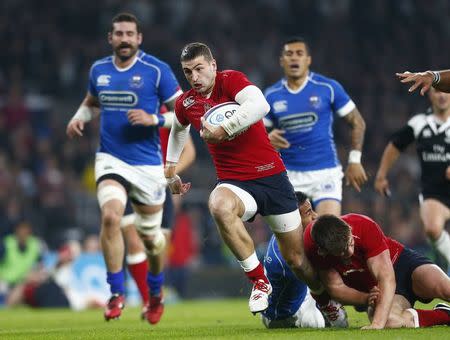 Jonny May of England runs in a try against Samoa during their international rugby test match at Twickenham in London, November 22, 2014 REUTERS/Andrew Winning