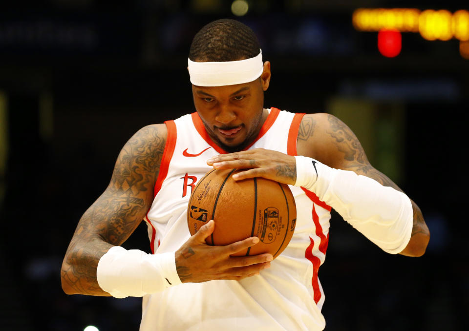 Carmelo Anthony and the Rockets haven’t broken up yet, but the player is already looking for a couch to crash on.. (AP Photo)