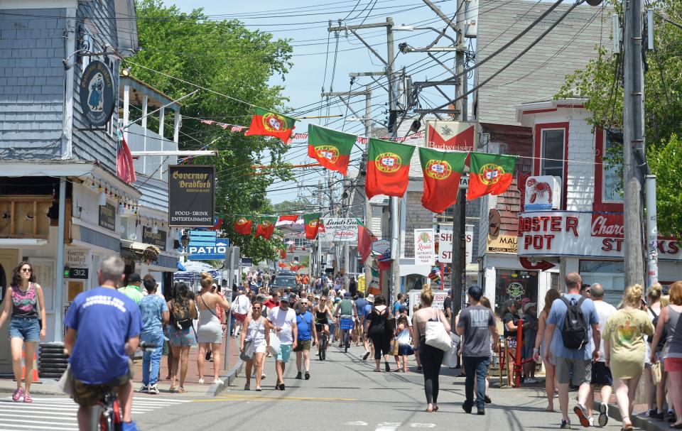 A bustling summer day along Commercial Street in Provincetown.