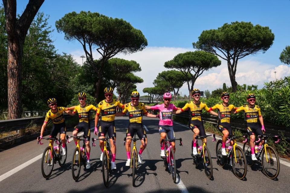 Overall leader JumboVismas Slovenian rider Primoz Roglic C poses with his teammates during the twentyfirst and last stage of the Giro dItalia 2023 cycling race 135 km in and around Rome on May 28 2023 Photo by Luca Bettini  AFP Photo by LUCA BETTINIAFP via Getty Images