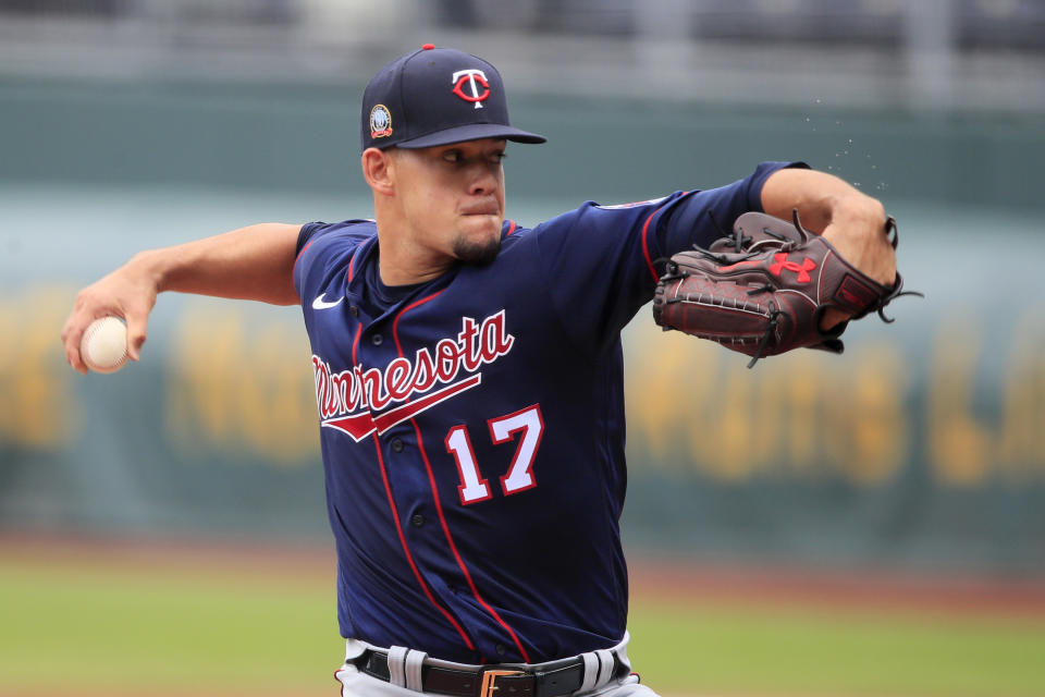 Minnesota Twins starting pitcher Jose Berrios delivers to a Kansas City Royals batter during the first inning of a baseball game at Kauffman Stadium in Kansas City, Mo., Sunday, Aug. 9, 2020. (AP Photo/Orlin Wagner)