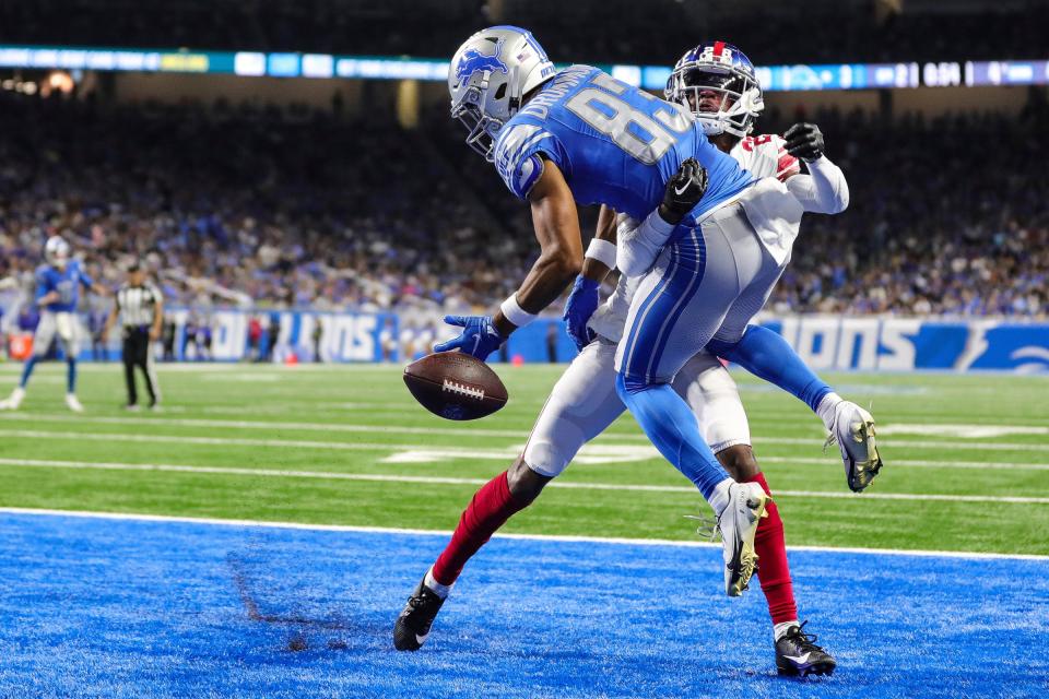 Detroit Lions wide receiver Dylan Drummond can't make a catch in the end zone against New York Giants cornerback Cor'Dale Flott (28) during the first half of a preseason game at Ford Field in Detroit on Friday, Aug. 11, 2023.