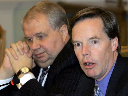 FILE PHOTO: U.S. Undersecretary of State Nicholas Burns (R) and his Russian counterpart Deputy Foreign Minister Sergei Kislyak attend a news conference in Moscow, December 2, 2005. REUTERS/Viktor Korotayev/File Photo