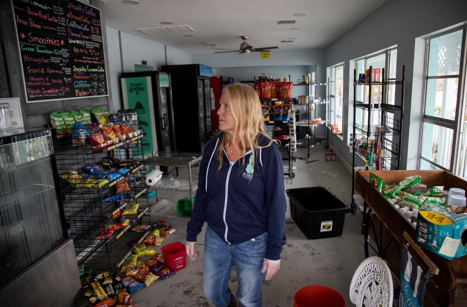 Debra Campana, owner of The Fig East End, looks over the damage to the restaurant on Thursday, Oct. 20, 2022. Campana and her husband Jeramie also own 400 Rabbits and Paper Fig Kitchen on the island.