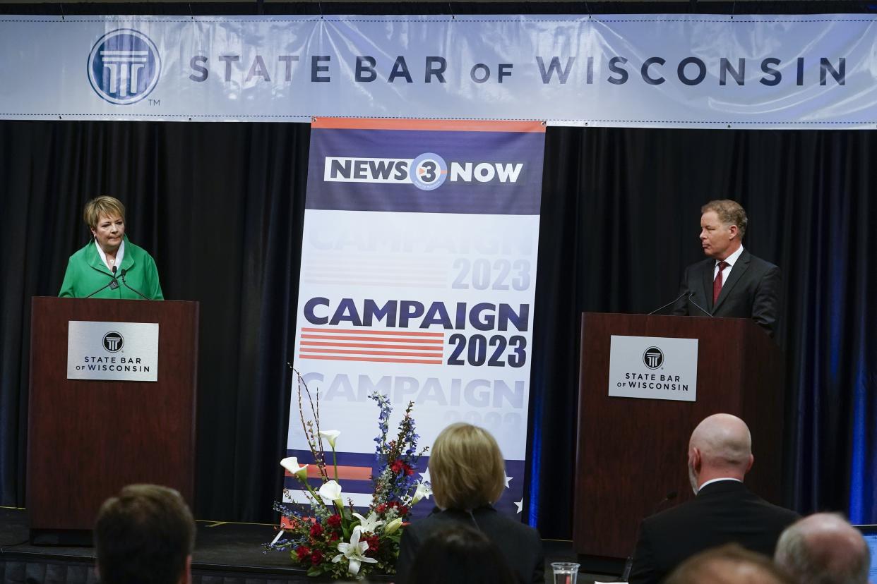 Wisconsin Supreme Court candidates Democratic-supported Janet Protasiewicz and Republican-backed Dan Kelly participate in a debate Tuesday, March 21, 2023, in Madison, Wis. (AP Photo/Morry Gash)