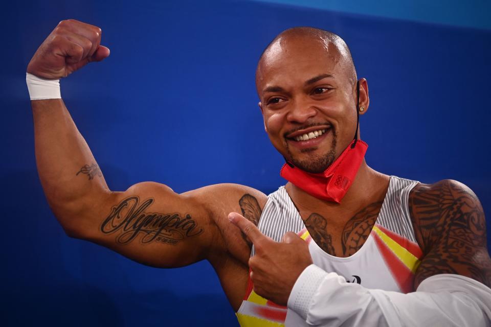 <p>TOPSHOT - Spain's Rayderley Zapata celebrates after winning silver in the floor event of the artistic gymnastics men's floor exercise final during the Tokyo 2020 Olympic Games at the Ariake Gymnastics Centre in Tokyo on August 1, 2021. (Photo by Loic VENANCE / AFP) (Photo by LOIC VENANCE/AFP via Getty Images)</p> 