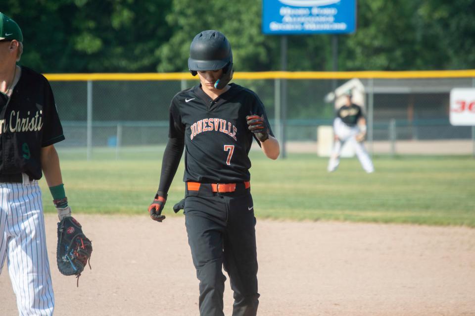 Comet pitcher Drew Bradley gets a base hit for the Comets in their regional semifinal game against Lumen Christi.