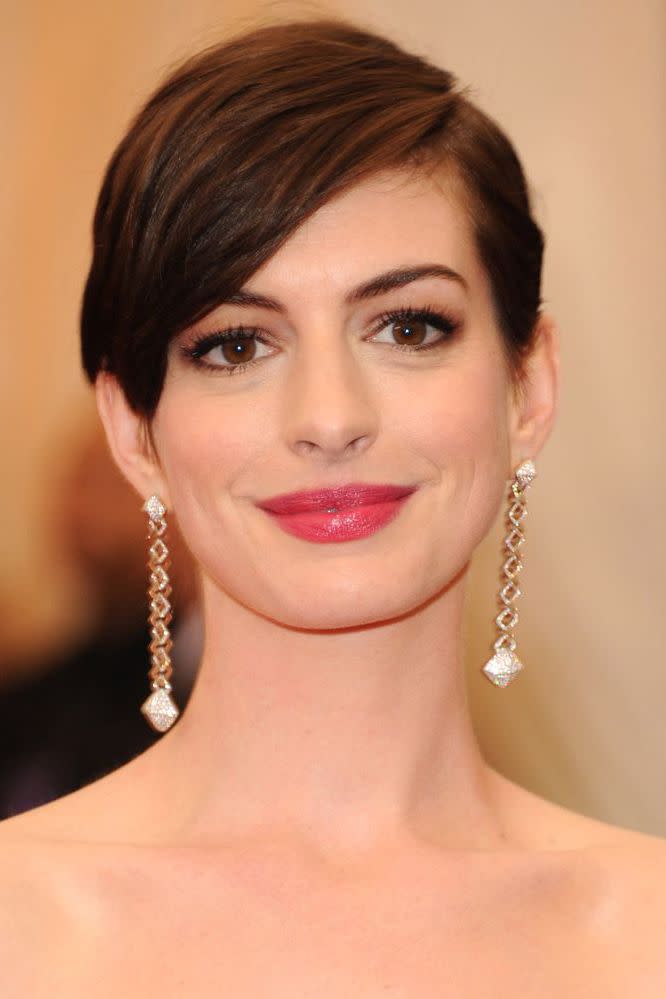 <p>When we watched Anne Hathaway shave off her own hair for real in Les Miserables we weren't so sure about the tufty finish. One sleek transformation later and Anne's crop is red-carpet ready.</p>