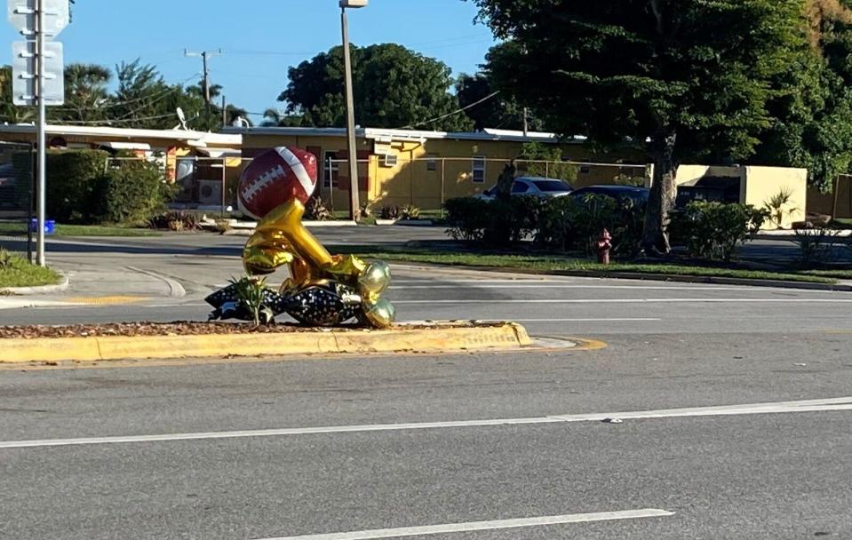 Balloons at a memorial to 13-year-old Stanley Davis Jr., who died during a traffic stop while riding his dirt bike in Boynton Beach, Florida. / Credit: WPEC-TV