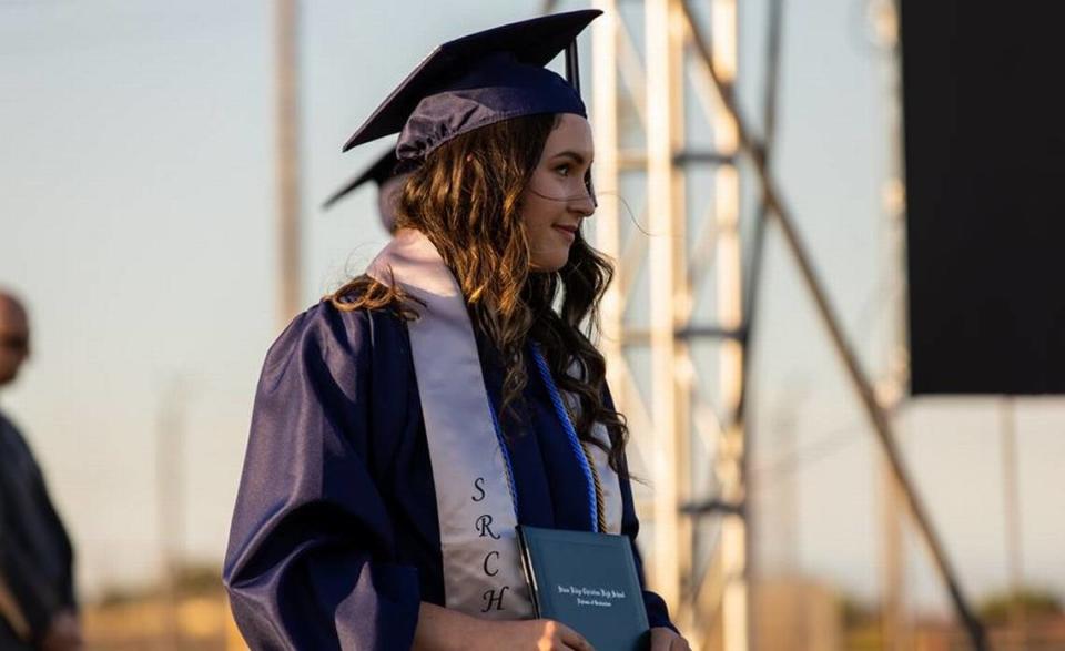 Stone Ridge Christian High senior Aracelli Tilly holds her diploma during the school’s graduation ceremony, which was held on Thursday, May 21, 2020 at Castle Field.