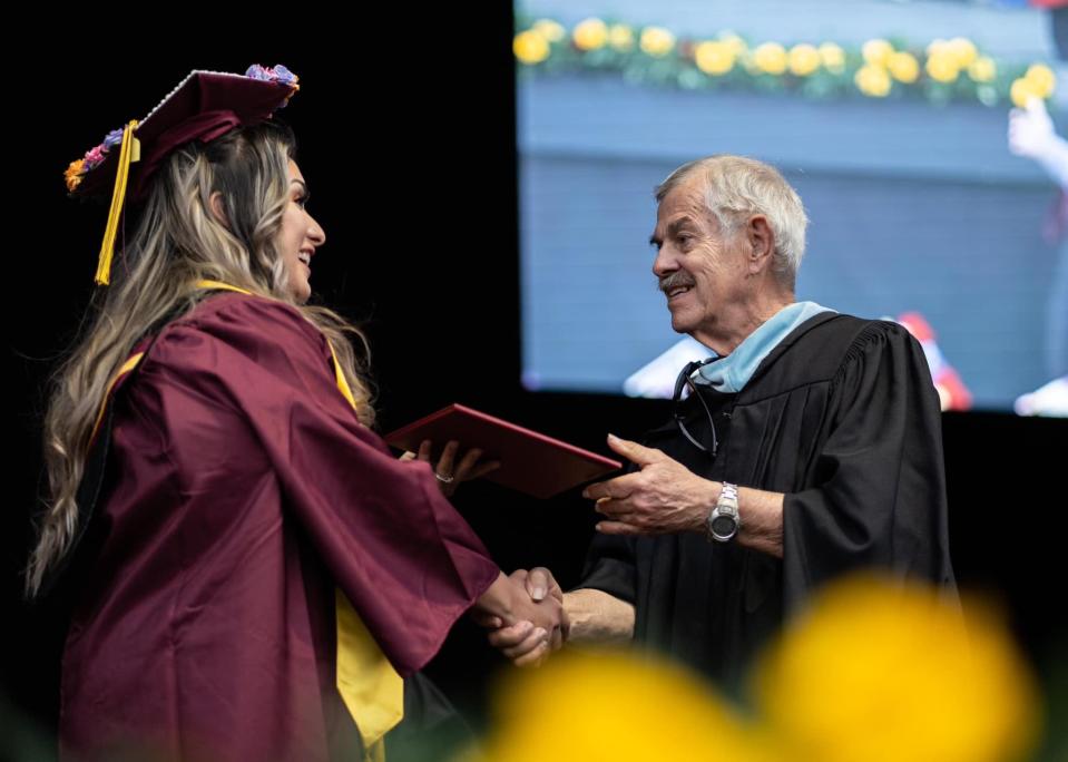 Victor Valley College officials announced the death of 77-year-old Dennis L. Henderson, the longest-serving member of the college Board of Trustees.