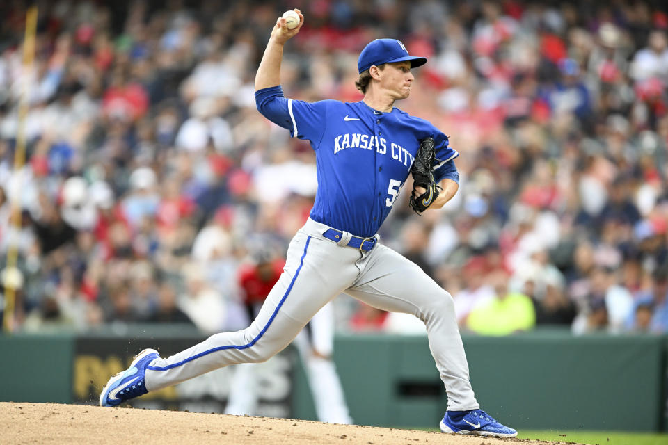 Kansas City Royals starting pitcher Brady Singer delivers during the first inning of a baseball game against the Cleveland Guardians, Saturday, July 8, 2023, in Cleveland. (AP Photo/Nick Cammett)