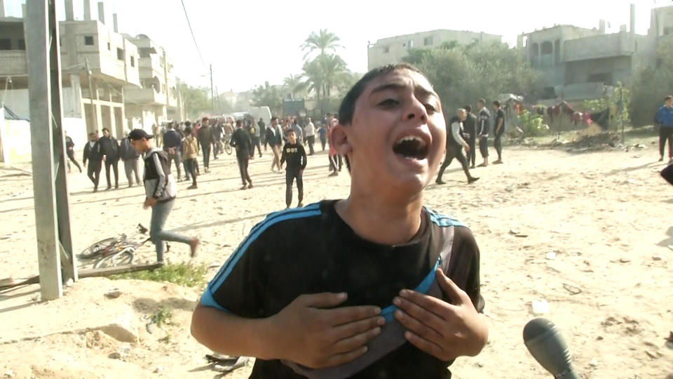 Palestinian teenager Omar Hahrous speaks with CBS News at the scene of an Israeli airstrike in Rafah, southern Gaza, Dec. 1, 2023, right after a temporary cease-fire collapsed between Israel and Hamas. / Credit: CBS News