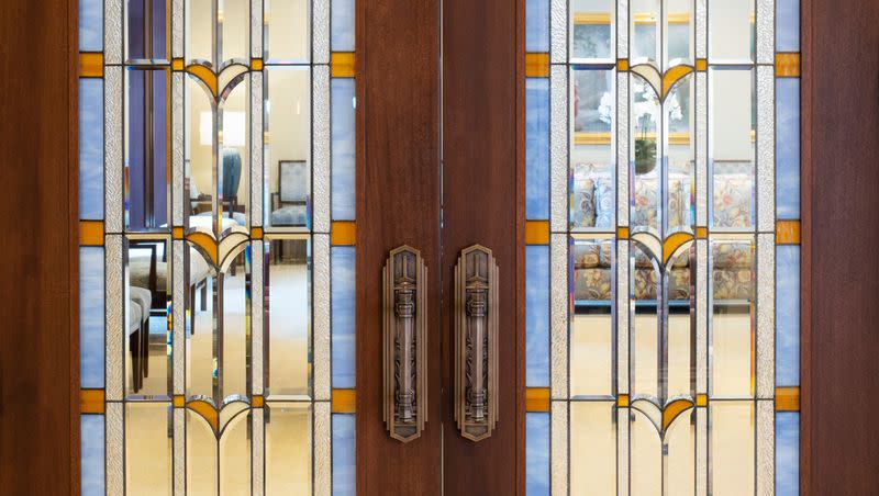 Some of the doors, made of Sapele African mahogany, in the Saratoga Springs Utah Temple feature art glass and hardware designs of wetland grass and water representing nearby Utah Lake.