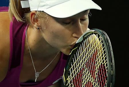 Australia's Daria Gavrilova kisses her racquet during her second round match against Czech Republic's Petra Kvitova at the Australian Open tennis tournament at Melbourne Park, Australia, January 20, 2016. REUTERS/Issei Kato